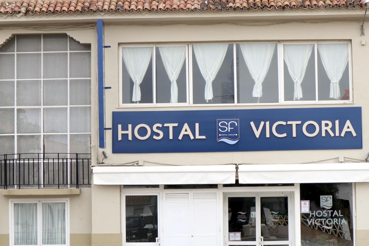 Отель Hostal Victoria Ла-Карлота Экстерьер фото